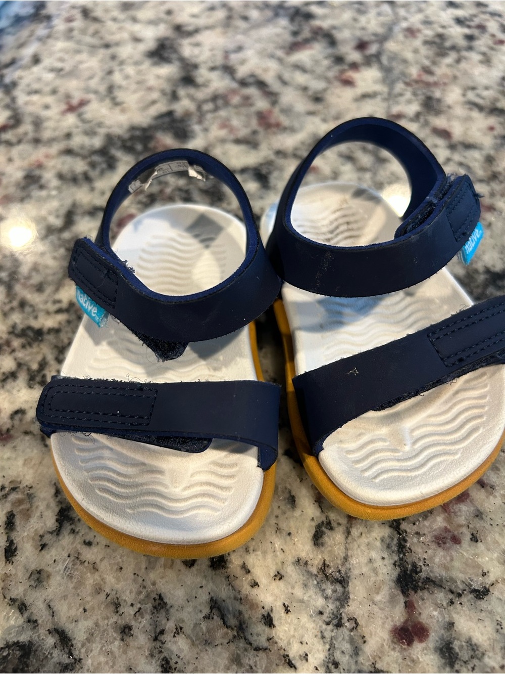 Native Navy Blue Kids Sandals with White Footbed and Tan Outsole